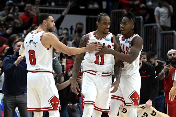 February 24, 2022; Chicago Bulls forward DeMar DeRozan celebrates with Zach LaVine Ayo Dosunmu during the game vs. Atlanta Hawks